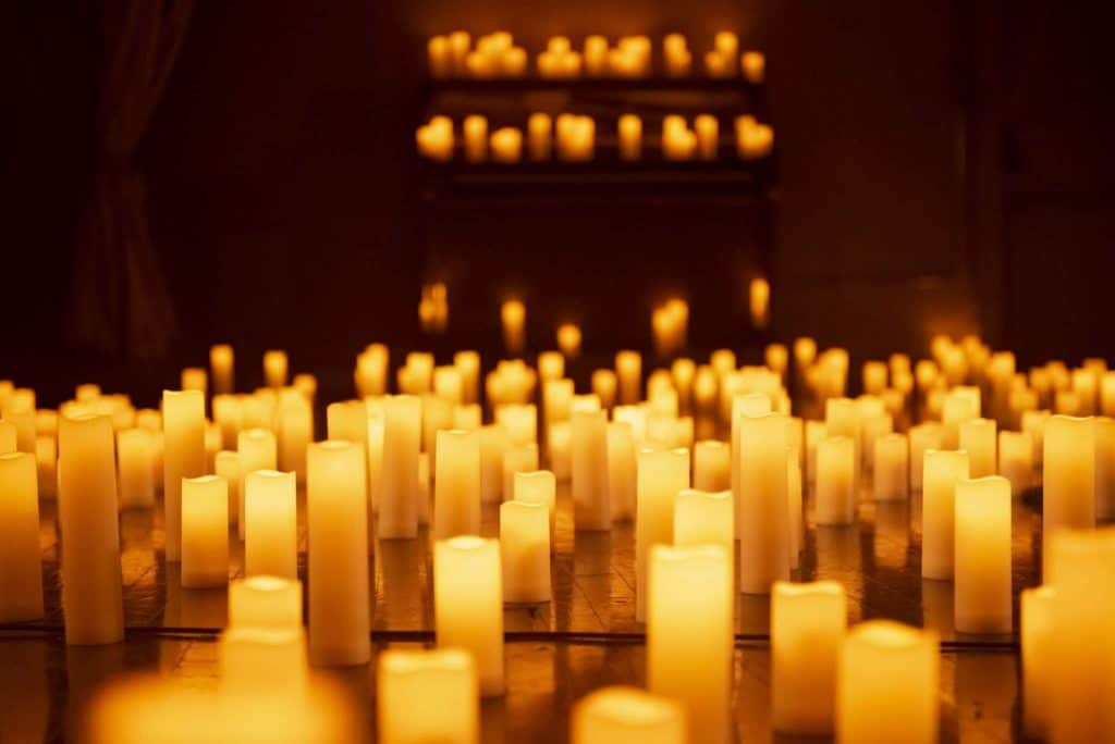 A close-up of hundreds of candles.