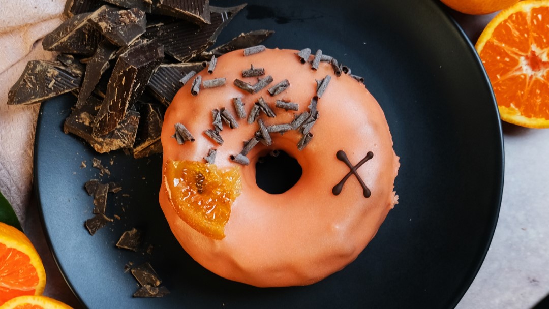 An orange doughnut from Crosstown
