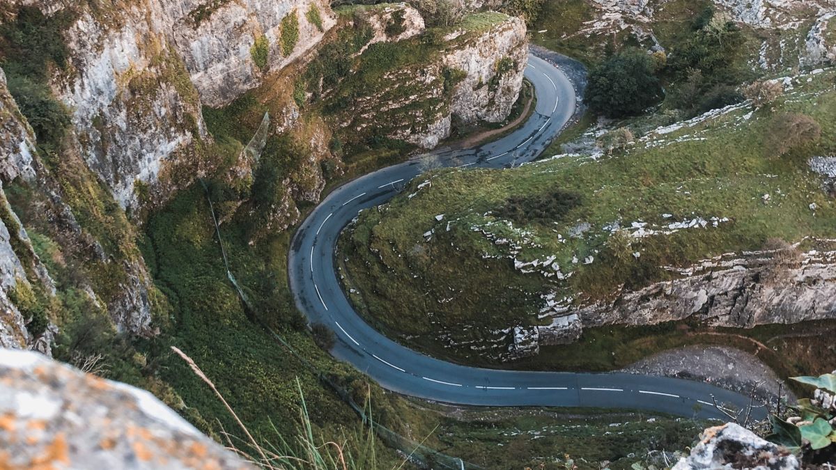 Swerving roads through cliffsides for Cheddar Gorge, one of the best day trips from Bristol