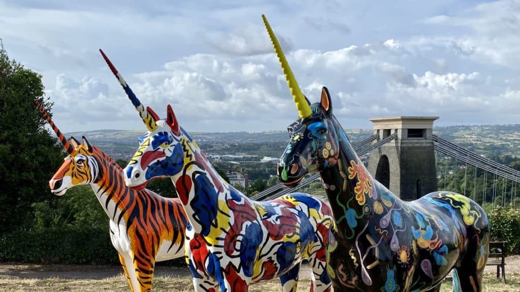A row of unicorns in front of Clifton Suspension Bridge