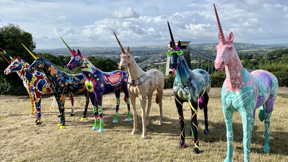 A row of unicorns in front of Clifton Suspension Bridge