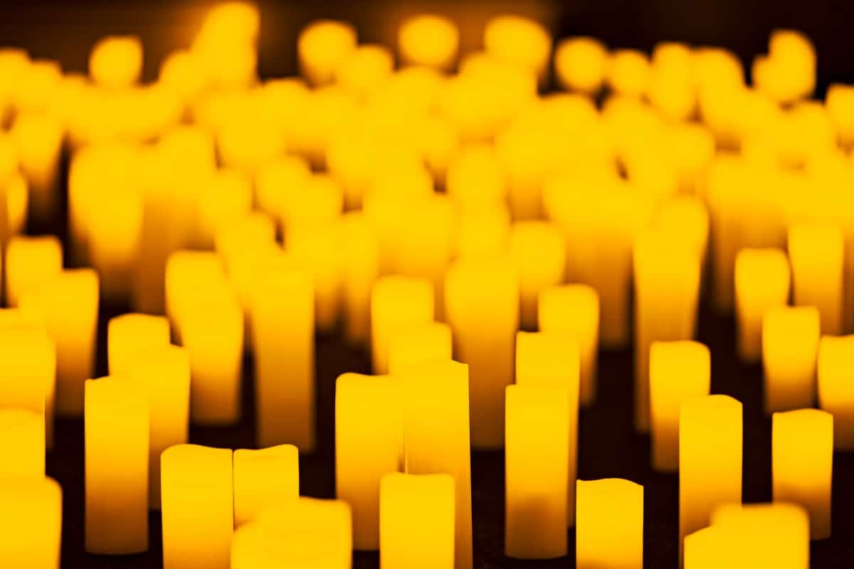 A close-up shot of hundreds of candles.