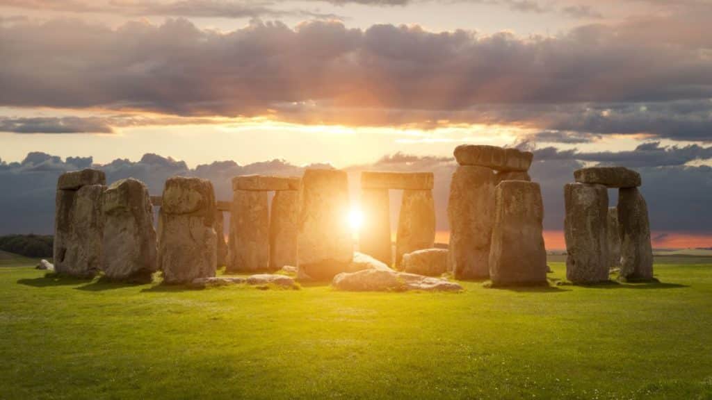 The sun directly shining through Stonehenge, Wiltshire, England during Summer Solstice