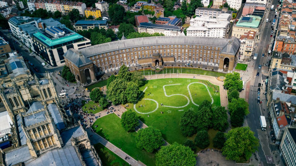 a hopscotch court in College Green, Bristol, spelling out 650