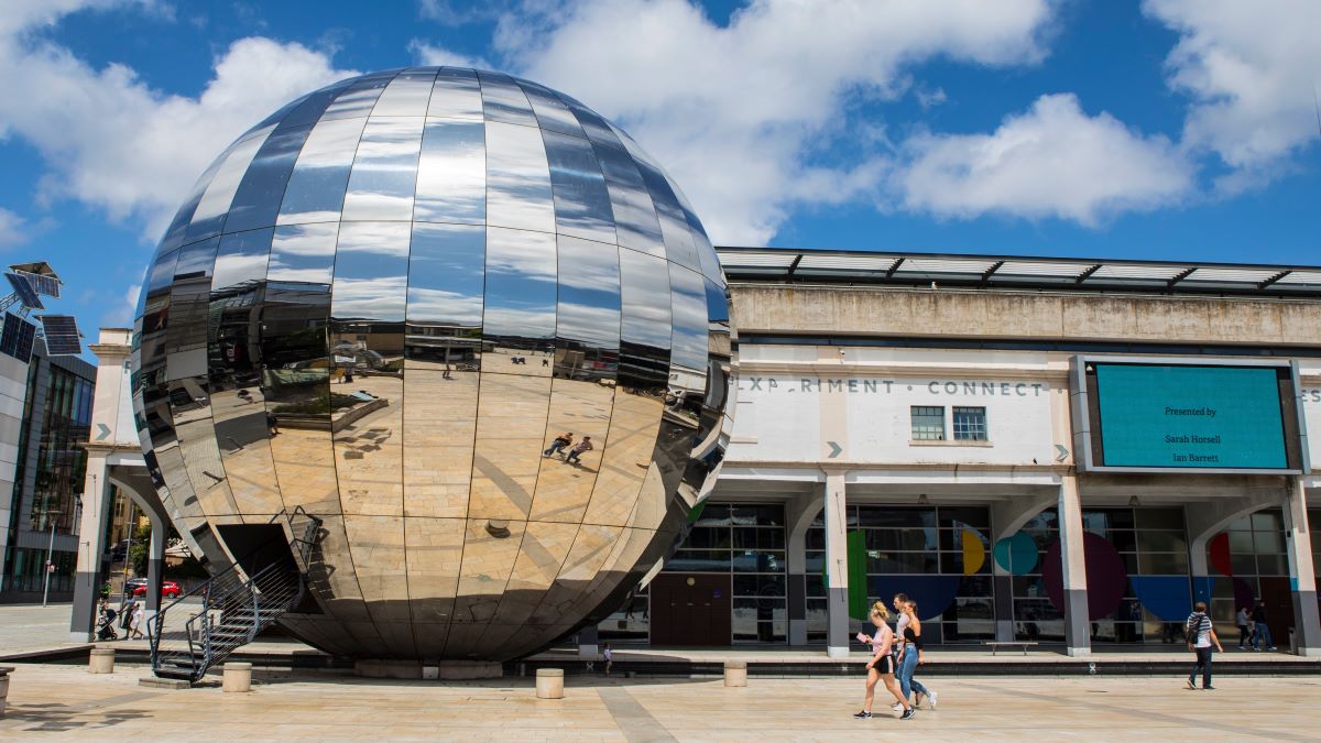 The large reflective silver sphere is home to a Planetarium at We The Curious, often called the wrong name of @Bristol