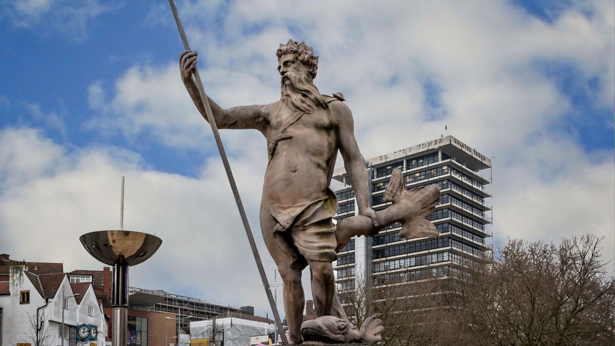 Statue of Neptune holding a Trident in the Centre Promenade, St Augustine's Parade, Bristol, Avon, UK on 31 December 2019