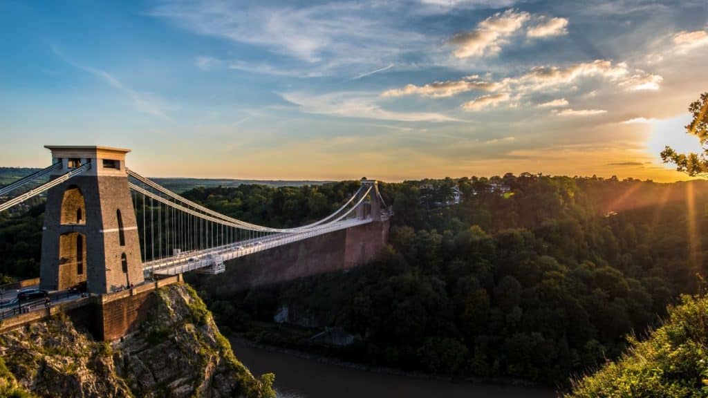 Clifton Suspension Bridge, Bristol, UK with sunset and sunbeams