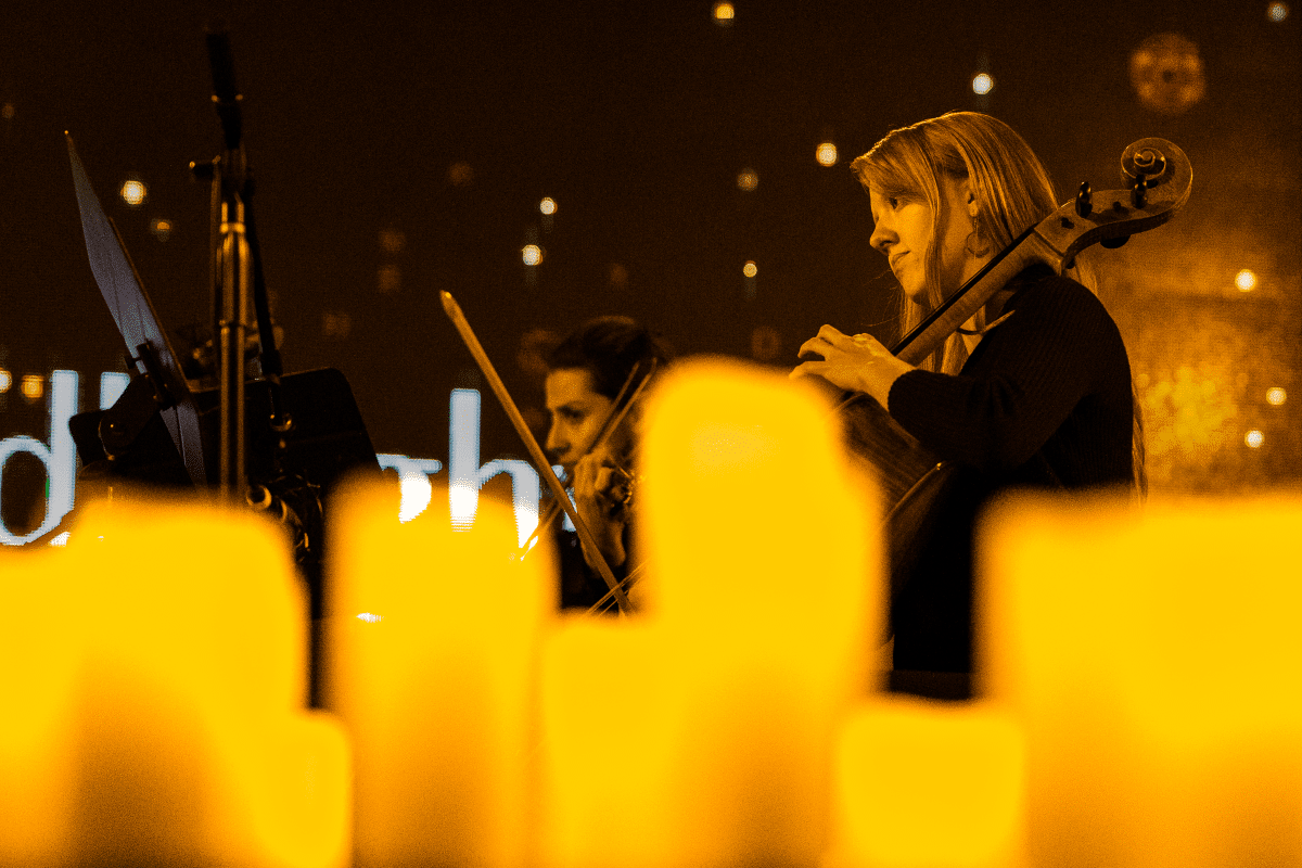 A string quartet performing by candlelight 