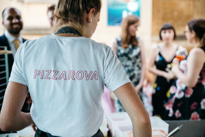 Woman wearing a Pizzarova T-shirt